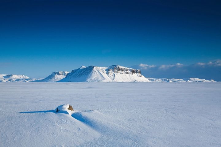 Snowfield and Distant Peak