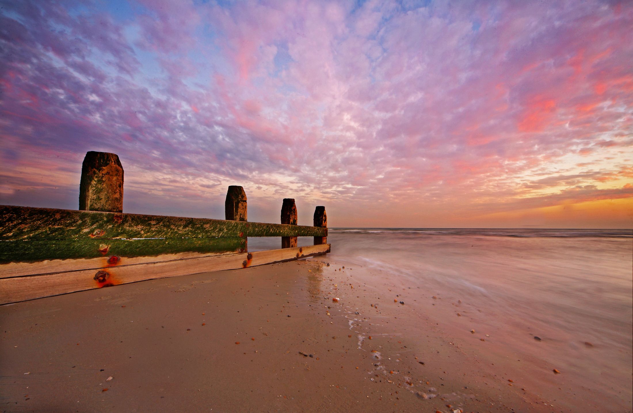 Pink Skies over the Groynes