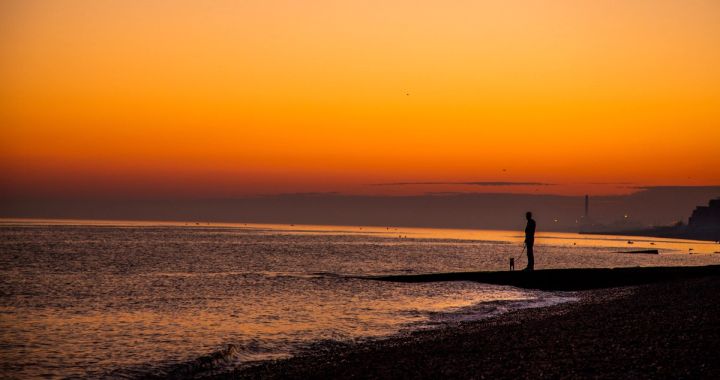 Lone Figure at Sunset