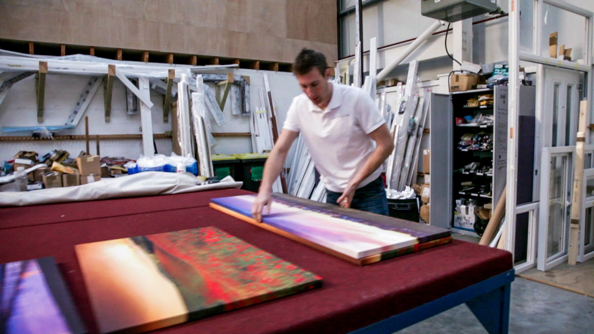 Preparing canvases in the Sussex workshop