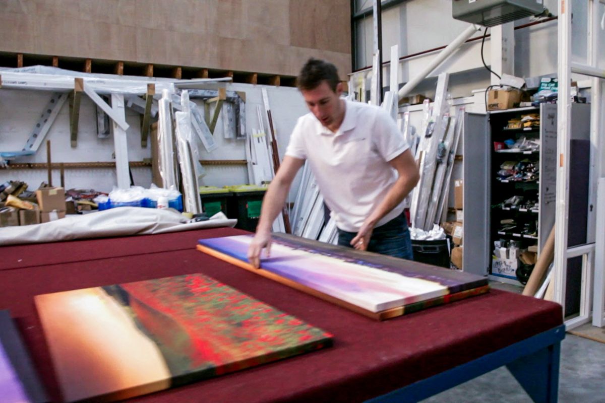 Preparing canvases in the Sussex workshop