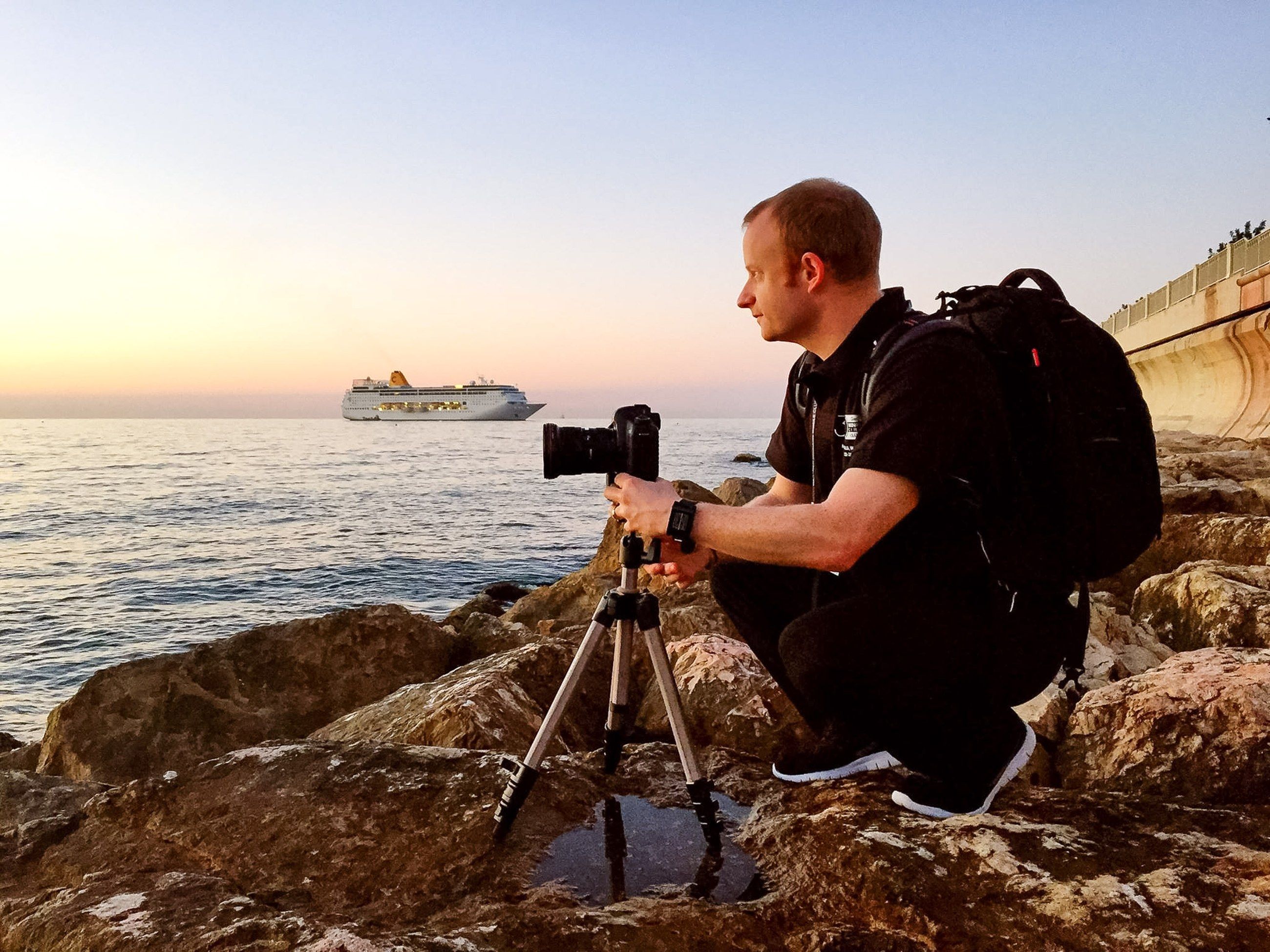 Waiting for the light on the rocks at sunrise